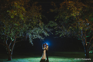 bride and groom outdoors in the evening