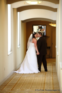 windsor ballroom bride and groom kissing in hallway