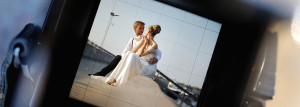 preview of bride and groom on camera