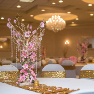 wedding ballroom gold sequins pink flowers
