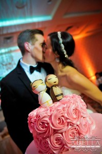 pink wedding cake with star wars cake toppers