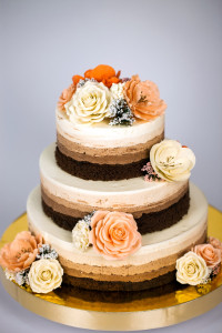 naked layered wedding cake with roses