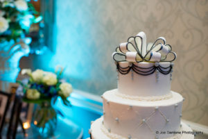 white wedding cake with black edging